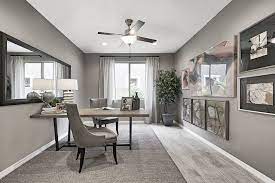 A Large Mirror Expands This Well Appointed Study Darius Model Home Surprise Arizona Richmond American Homes Home Richmond Homes Large Bookshelves