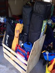 Made A Scrap Wood Camping Chair And Canopy Holder Last Night Made From 2x4s And 5 8 Plywood Chair Storage Camp Chair Storage Barn Storage