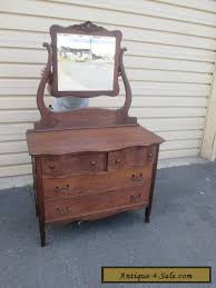 Tvilum 8 drawer double dresser, oak structure. 1 Antique Oak Victorian Dresser With Mirror For Sale In United States