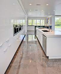 Epoxy flooring is a very durable yet affordable flooring option which makes it perfect for both commercial and residential applications. Metallic Epoxies Glitter On The Floor At A Contemporary Show House Concrete Decor Dinning Room Flooring Contemporary Kitchen Home