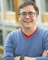 DNA Data Storage and Hybrid Molecular-Electronic Computing