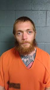 Altoona man with swastika tattoo charged for taping razor blade
