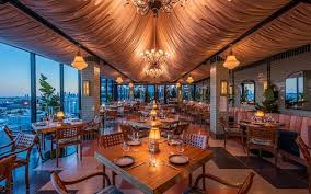 Dining located at town center. Merois By Wolfgang Puck Urbanologie