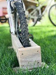 Bike forums made this functional and fun bike rack for just $90. Wood Bike Holder Promotions