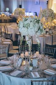 Winter wonderland table decorations with branches and twigs lend a rustic feel to a table's look. 20 Whimsical Winter Wonderland Wedding Centerpieces Emmalovesweddings