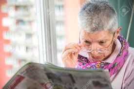 Senior Elderly Lady Having Troubles With Her Eye Glasses Cant See Well And Cant Read The Small Letters In The Newspapers Stock Photo Picture And Royalty Free Image Image 94307265