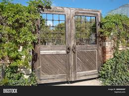 Sand off the old finish using an orbital sander. Old Wooden Gate Green Image Photo Free Trial Bigstock