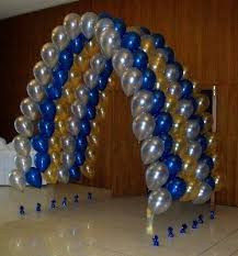 Pearl Balloon Arches Can Create Awesome Tunnels For Any Event Color Scheme Royal Blue Gold And White Balloon Diy Balloon Decorations Balloons