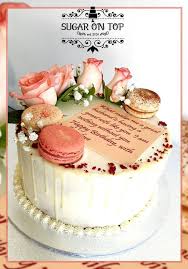 They may be small in size, but they're major in flavor and in style. Sugar On Top Red Velvet Cake With Fresh Flowers And Macarons Facebook
