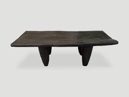 The wooden coffee table has a large interior storage compartment for clothes, books, magazines, and anything else you'd like to keep within reach but out of sight. Antique African Senufo Bench Or Coffee Table 48mv Andrianna Shamaris