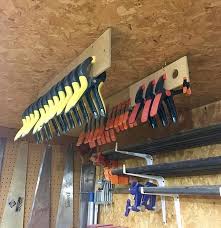I Have My Spring Clamps Organized By Hanging Them From The Ceiling On Small Pieces Of Hardboard Its The Woodworking Diy Garage Storage Clamp Storage