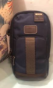 By browsing this site you agree to these cookies being set. New Tumi Slingbag Men S Fashion Bags Wallets Sling Bags On Carousell