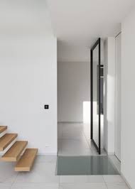 Porte en acier ou alu. Porte Vitree Sur Pivot Moderne Avec Des Profiles En Aluminium Anodise Style Atelier Binnendeuren Glazen Deur Interieur