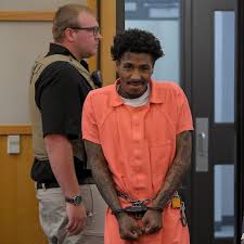 More pics from #nbayoungboy in court today 🙏🏾💚