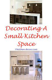 This is a small space so there are several clever storage solutions throughout. Kitchen Decorating Help Minimalist Kitchen Decor South African Kitchen Decor Low Budget Kitchen Kitchen Decor Modern Kitchen Design Decor Green Kitchen Decor
