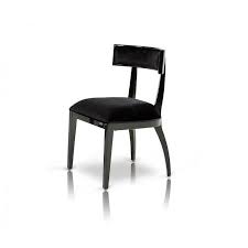 Whether you are looking for a fresh cottage feel or a breezy touch to your kitchen or dining room, this pair of dining chairs is the perfect finishing touch to any look. Alek Curved Open Back Black Dining Chair