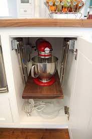 Make the necessary cuts in the kitchen cabinets, cutting out the wood to be able to fit the appliance using a jig saw or reciprocating saw. Where To Stash The Stand Mixer In Your Kitchen