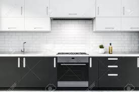 Whether you want inspiration for planning cabinet above sink or are building designer cabinet above sink from scratch, houzz has 259 pictures from the best designers, decorators, and architects in the country, including michael tauber architecture and kate johns designs. Close Up Of Gray Kitchen Countertops With Built In Stove And Stock Photo Picture And Royalty Free Image Image 131328539