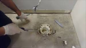 Use tapcon anchors or a similar type of masonry/ concrete screws to fasten the toilet flange to the concrete slab. How To Remove Toilet Flange From Concrete Floor Before Tiling Youtube