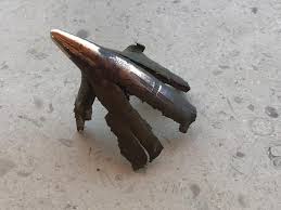 The metal would need to be past its melting point to work in a bullet mold. Found While Metal Detecting I Ve Polished Part Of It Looks Like A Bullet Why Does It Look Like It Was Shot From Behind Whatisthisthing