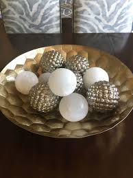 Gold decoration balls for shelf. What To Use To Style Or Fill Decorative Bowls Designed