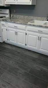 For a kitchen that encounters too much moisture, laminate flooring should be avoided. 19 Laminate Flooring In Kitchen Ideas Flooring Grey Flooring Laminate Flooring In Kitchen