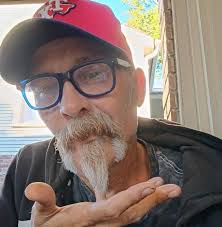 Macho Man Randy Savage painting a masterpiece of madness.