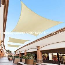 This golf shade canopy adopts the roofing frame of steel structure, and membrane is stretched above it, and the column is stable. Premium 100 Hdpe Uv Waterproof Shade Patio Waterproof Shade Canopy Shade Sail China Waterproof Shade Net Plastic Net Made In China Com