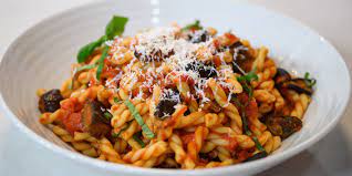 classic italian pasta alla norma features tender eggplant bright tomato sauce and freshly grated ricotta salata fresh tomato sauce italian dinner alla norma