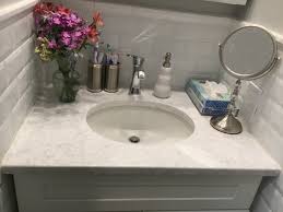 Simple subway tile offers an affordable countertop option in the bathroom of this 1920s bungalow. Vanity Tile Backsplash Ideas Monk S Home Improvements