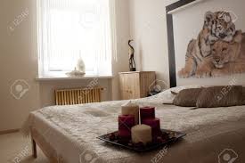 Nothing gives a romantic ambiance like candlelight, so find several fragrances and colors that you and your spouse love, and make it a habit of burning. Romantic Bedroom With Candles Stock Photo Picture And Royalty Free Image Image 13562953