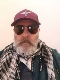 Is it possible expansion is being caused by the slowing down of the  traveling of the while universe. And then our time is created by expansion?  Coukd the whole universe be traveling