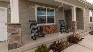 Collection by stacey yeager • last updated 2 weeks ago. Panorama Two Rocking Chairs At The Front Entrance To A House Stock Photo Picture And Royalty Free Image Image 137680808