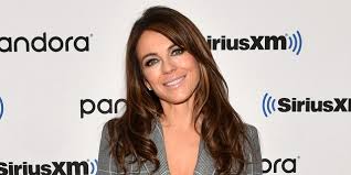 She featured in movies like austin powers: Elizabeth Hurley 56 Glows In Sheer Golden Versace Gown About Last Night Fox News
