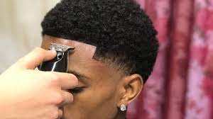 It's less high maintenance than a full afro and helps frame your face, making your features look sharper. Haircut Tutorial Afro Taper Blowout By 16 Year Old Barber Youtube