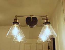Ideally, the mirror should be mounted a few inches higher than the tallest point of your vanity faucet, or between 5 to 10 inches above the bathroom sink. How To Mount A Light On Top Of A Mirror Bathroom Vanity