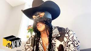 Enigmatic vocalist who filters country music through shoegaze and goth influences, with subversive, atmospheric results. Orville Peck Favorite Fashion Moments In Country Music Mtv News Youtube