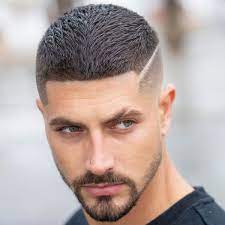 Flip one side of the long top over and let it cascade down the shaved sides of the head in the same way a wave moves as it rolls and crashes. High Fade Male Haircut Novocom Top