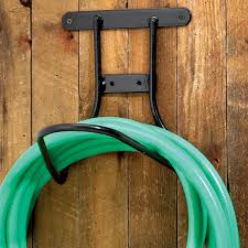 Also Great For Extension Cordsconstructed From Solid Steel Rod With Smooth Baked Black Plastic Coating Our I Hose Hanger Garden Hose Hanger Garden Hose Holder