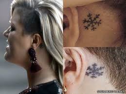 If it's a singular lightning bolt, then it probably means next to nothing. Kelly Clarkson S 14 Tattoos Meanings Steal Her Style