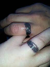 His And Hers Wedding Ring Eagle Feather Tattoos Hubby And I Just Got These Today Original Concep Tattoo Wedding Rings Wedding Band Tattoo Ring Finger Tattoos