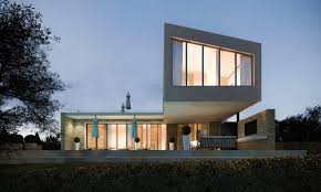 Exclusive facade design with conceptual lighting highlighting architectural details. Design Villa Modern Interior Design