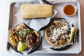 I set out a few choices of toppings so my kids can make. Taco Libre In West St Paul Heavy Table