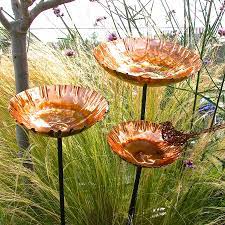 A garden ornament is an item used for garden, landscape, and park enhancement and decoration. Copper Garden Birdbath Bird Feeder Bowl Sculpture