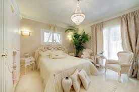 Gray wallpaper with a fun floral print in pink and green sets the tone for this chic, feminine. Cozy Feminine Bedroom Ideas For Relaxation And Boosting Your Energy
