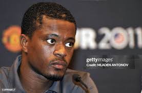 Romona Johnson plays in a fountain at the Inner Harbor with her... News  Photo