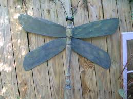 Dragonfly Made From Ceiling Fan Blades And Table Leg Ceiling Fan Crafts Ceiling Fan Art Fan Blade Art