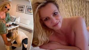 Britney Spears gets licked by mystery man, goes topless in new videos  shared days after announcing divorce | Fox News
