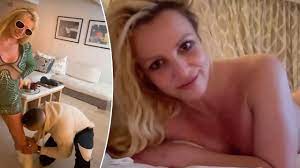 Britney Spears gets licked by mystery man, goes topless in new videos  shared days after announcing divorce