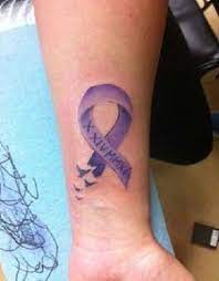 9 Most Captivating Purple Tattoo Designs Styles At Life Purple Tattoos Crohns Tattoo Purple Ribbon Tattoos